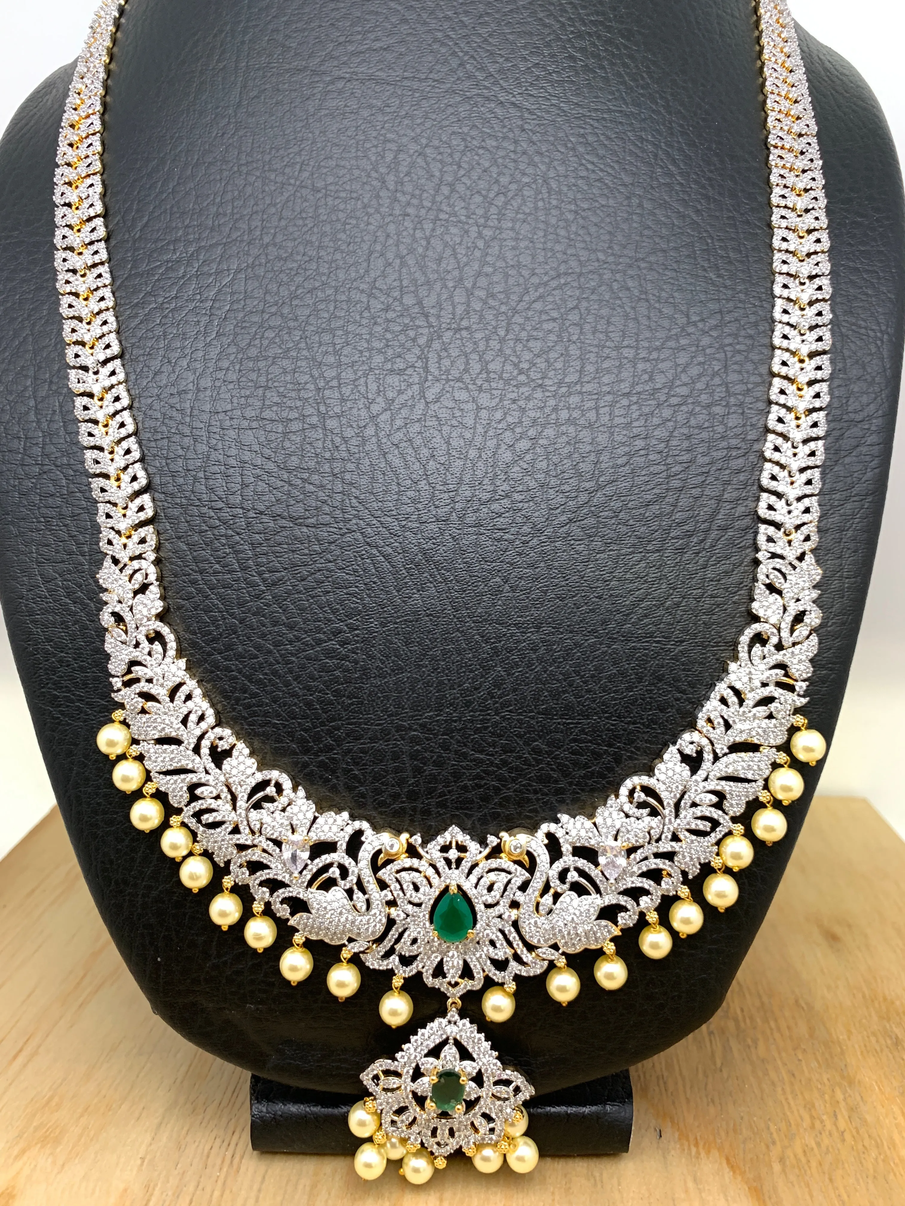 American Diamonds Ganga Jamuna Finish and Emrald Green Stone Pearls and CZ Stiff Long Necklace